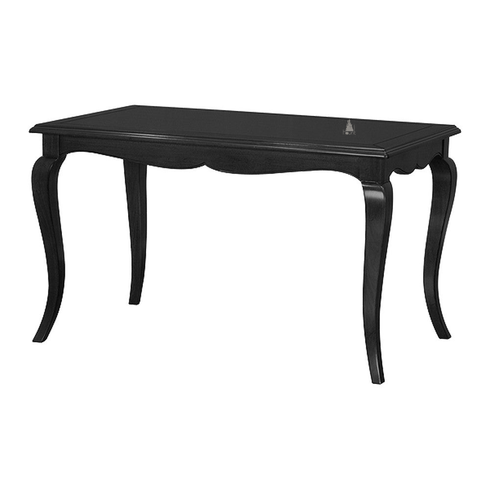 The Temptress Dining Table, a handcrafted black dining table with a shaped apron and simple curved legs.