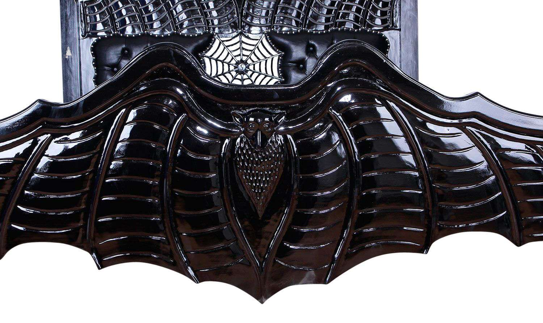 The Vamp Couture Bed, a handcrafted four-poster bed with twisted posts, spiderweb detailing, tufted headboard panels and bat-inspired footboard.