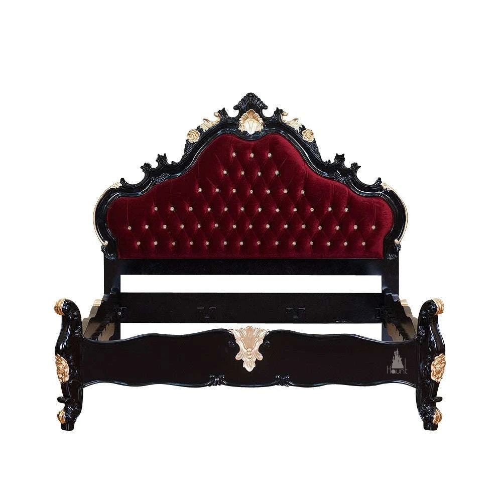 The Vampiress Bed, a handcrafted upholstered bed with a tall serpentine headboard, deep button tufting and carved gothic detailing.