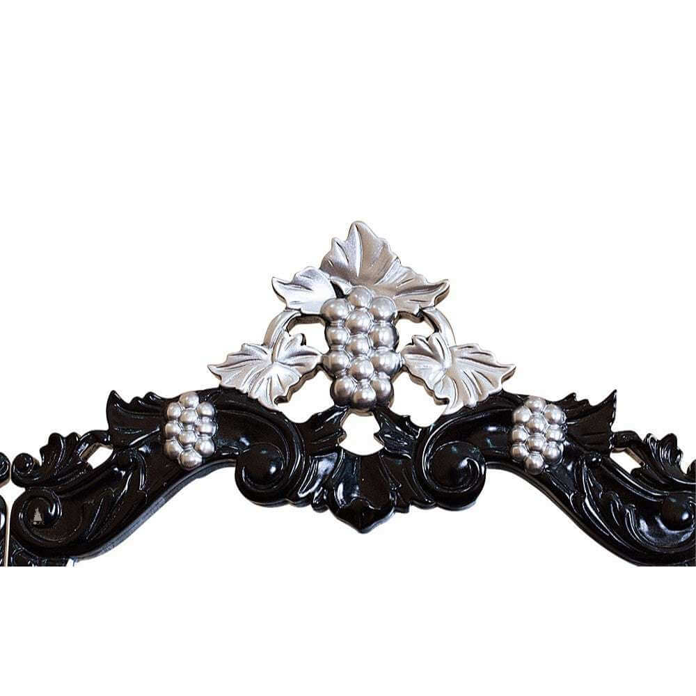 Vampiress Vanity by Haunt Cult, a dark ornate vanity with a round central mirror, high open carved crest, side scroll supports, small drawers and an intricately carved base on curved feet, image 6