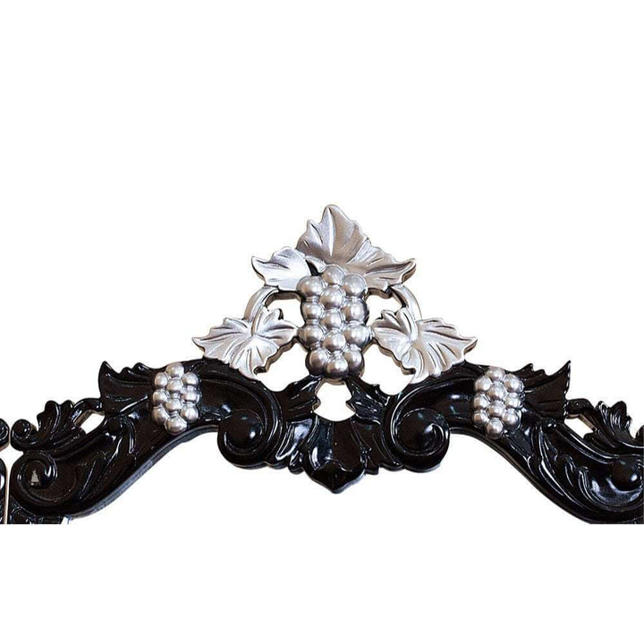 Vampiress Vanity by Haunt Cult, a dark ornate vanity with a round central mirror, high open carved crest, side scroll supports, small drawers and an intricately carved base on curved feet, image 6